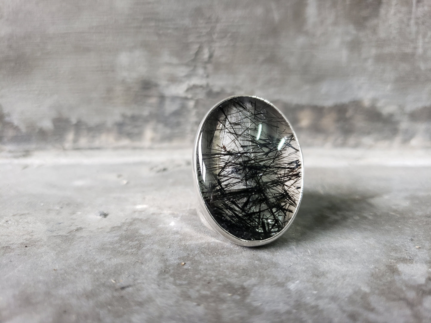 Oval Rutilated Quartz On A Silver Band
