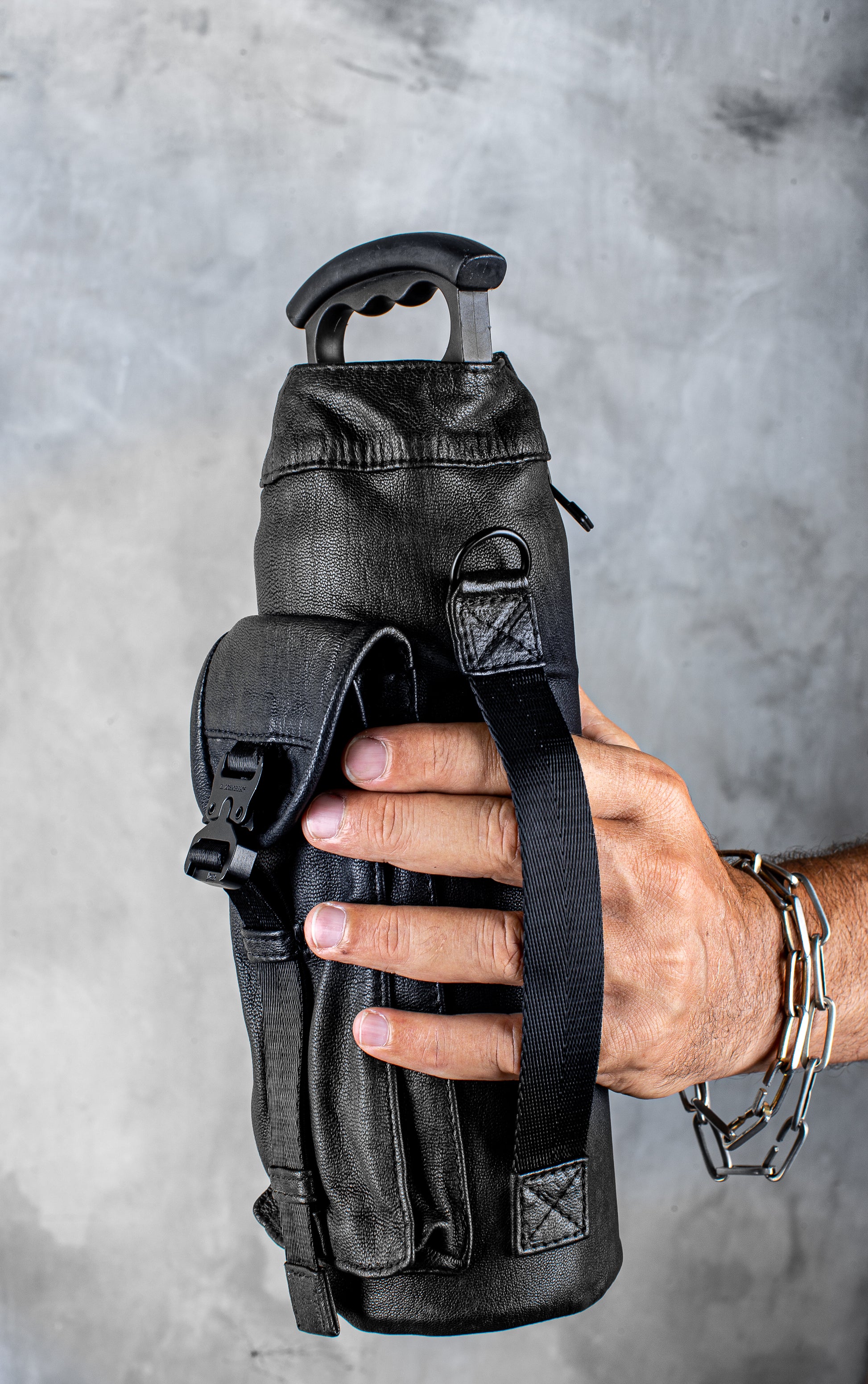 black leather backpack with water bottle holder Function 1 Black Leather Water Bottle Holder Bag with Phone Pocket – Jungle Tribe LA
