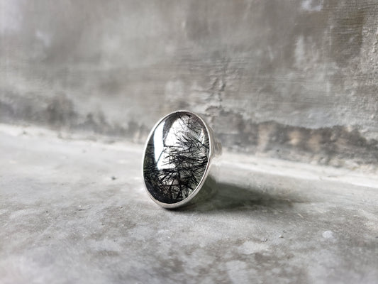 Oval Rutilated Quartz On A Silver Band